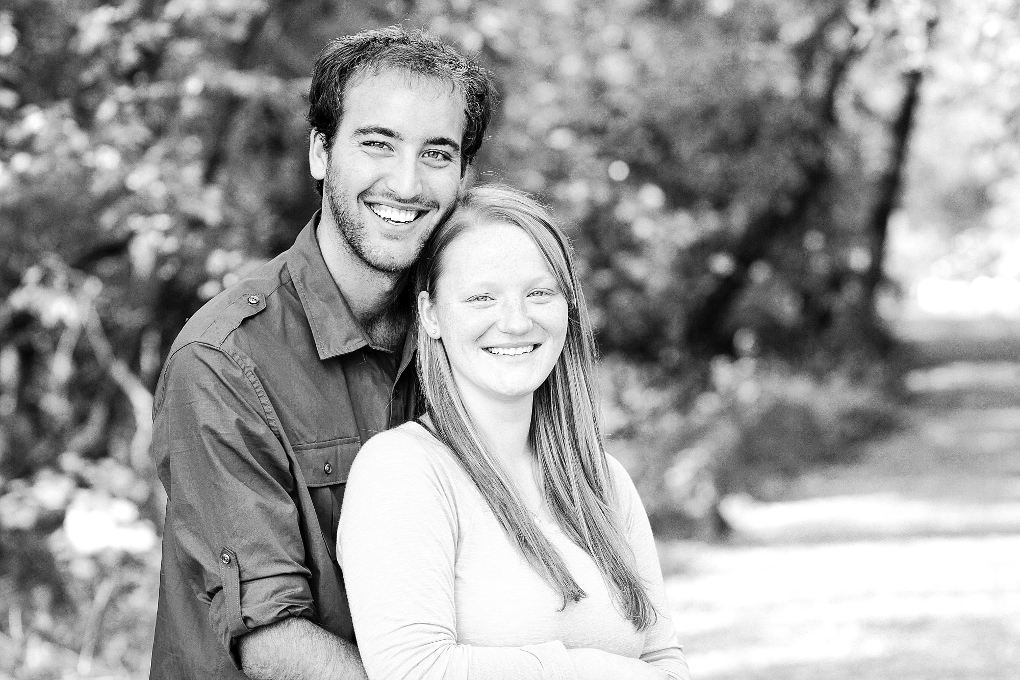 Black and White couple portrait along the trees in Buffalo River State Park Engagement Session
