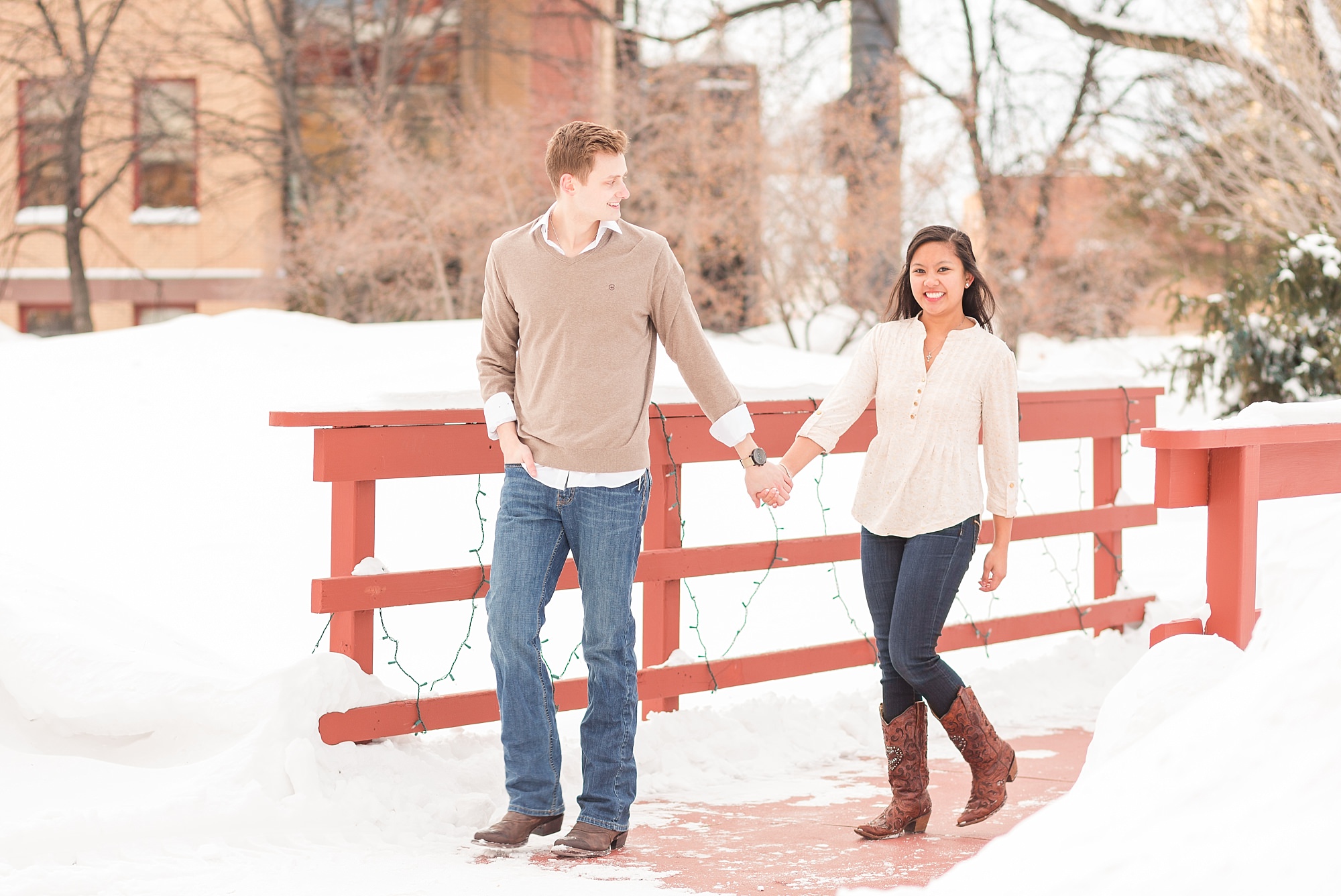 NDSU Engagement session on the snowy walking bridge
