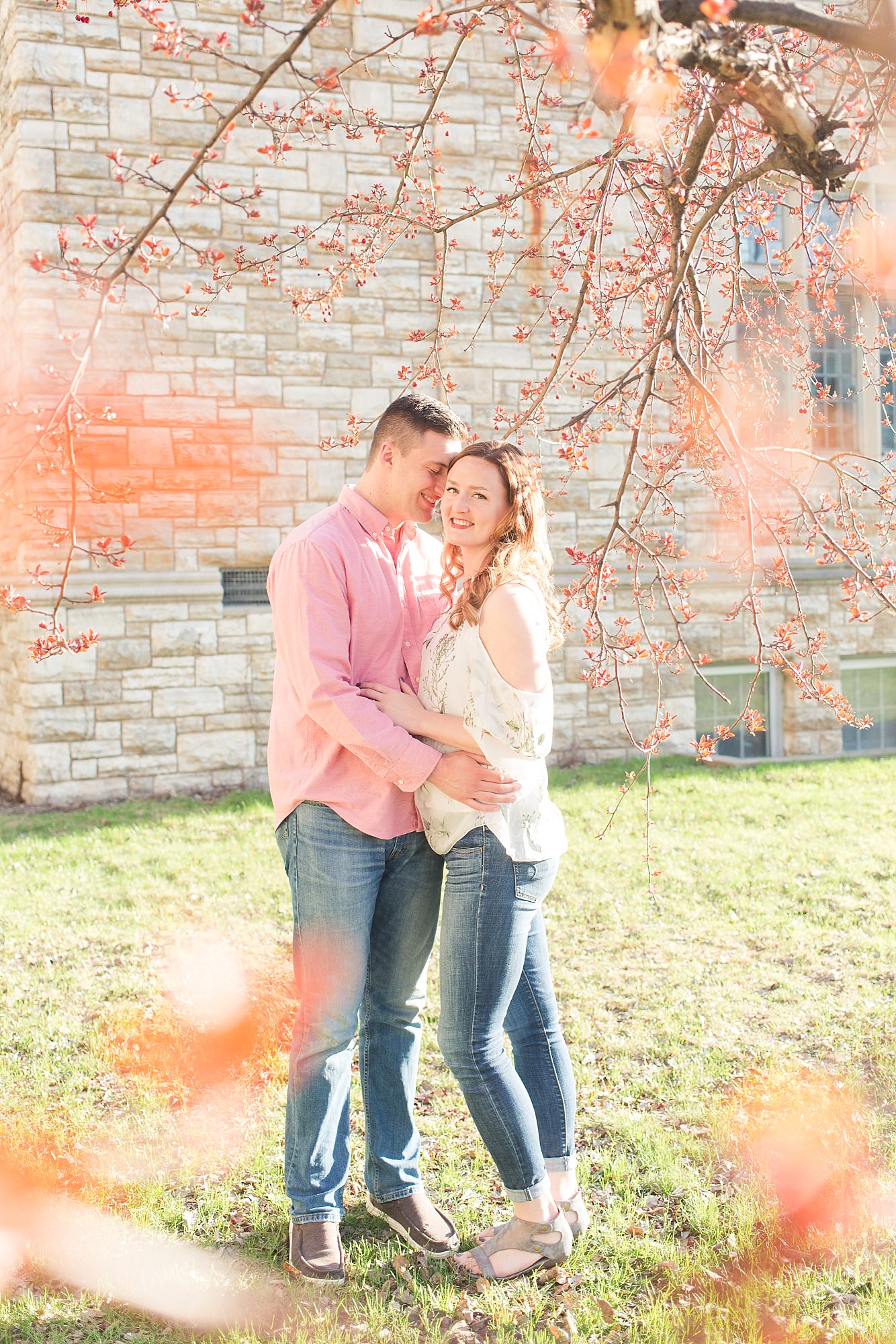 Spring Engagement Session in Shades of Pink Surrounded by Spring Blooms
