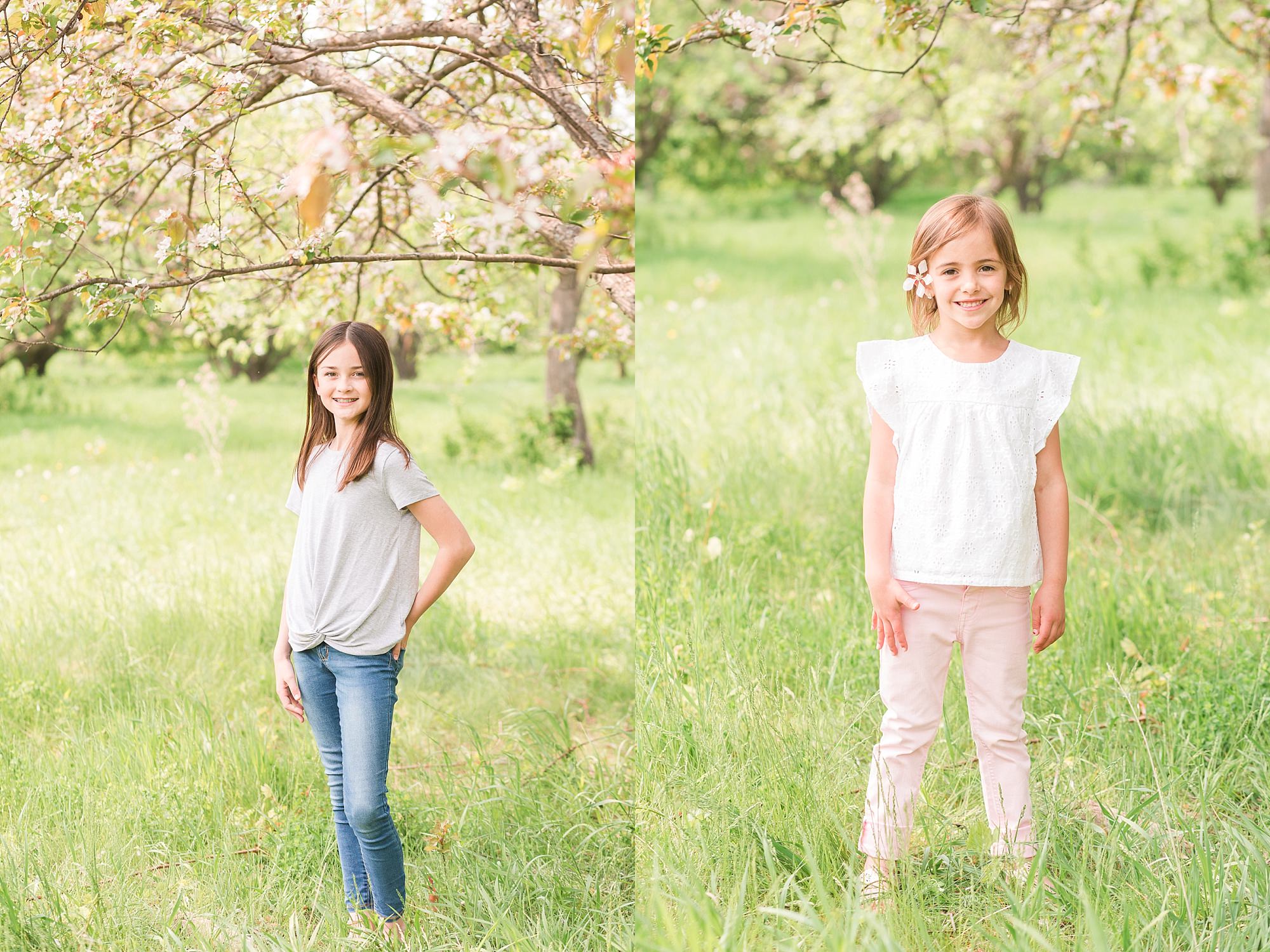 Two girls pose in grey and pink for spring photos