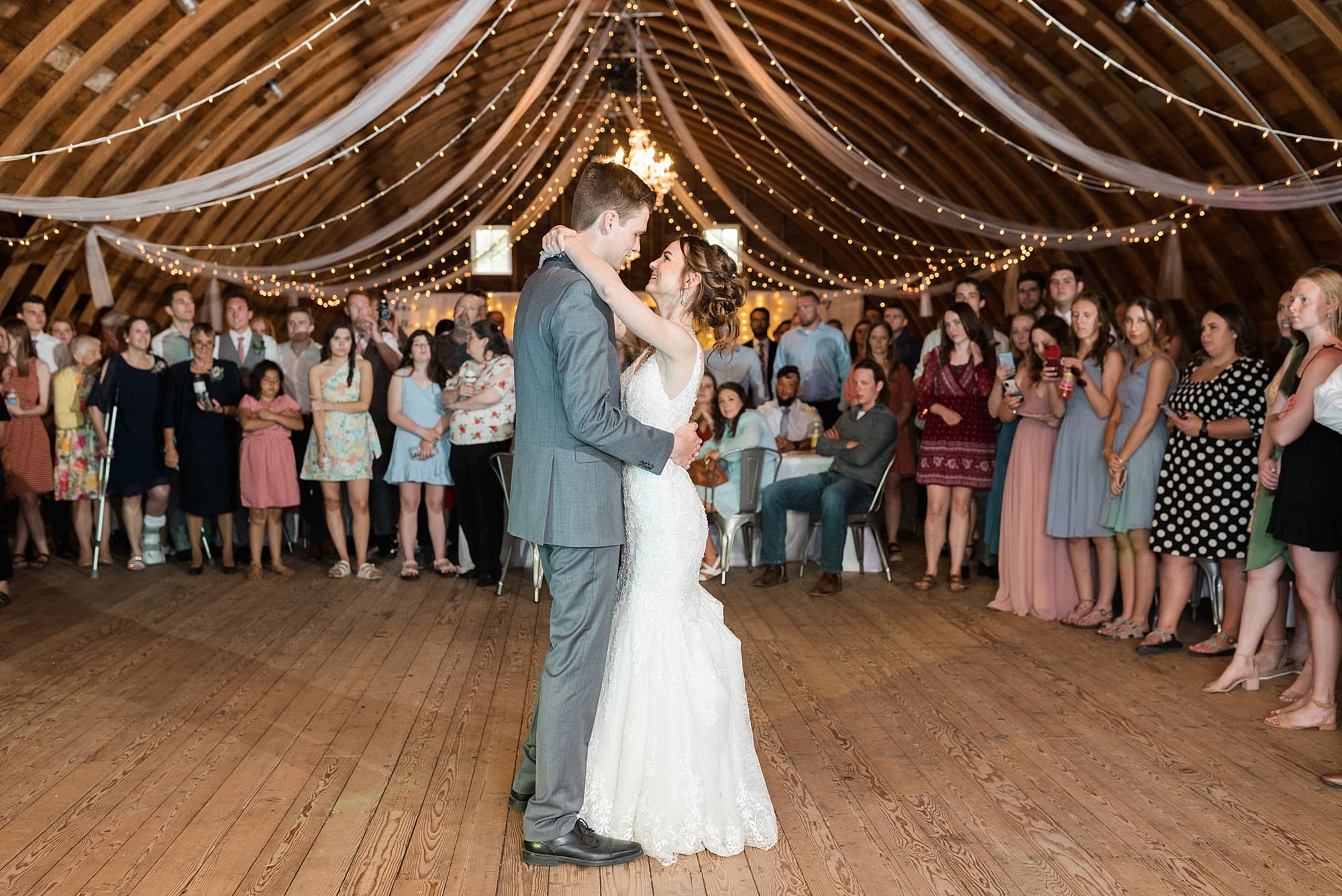 Bride and Groom share their first dance at their Legacy Acres Events wedding reception