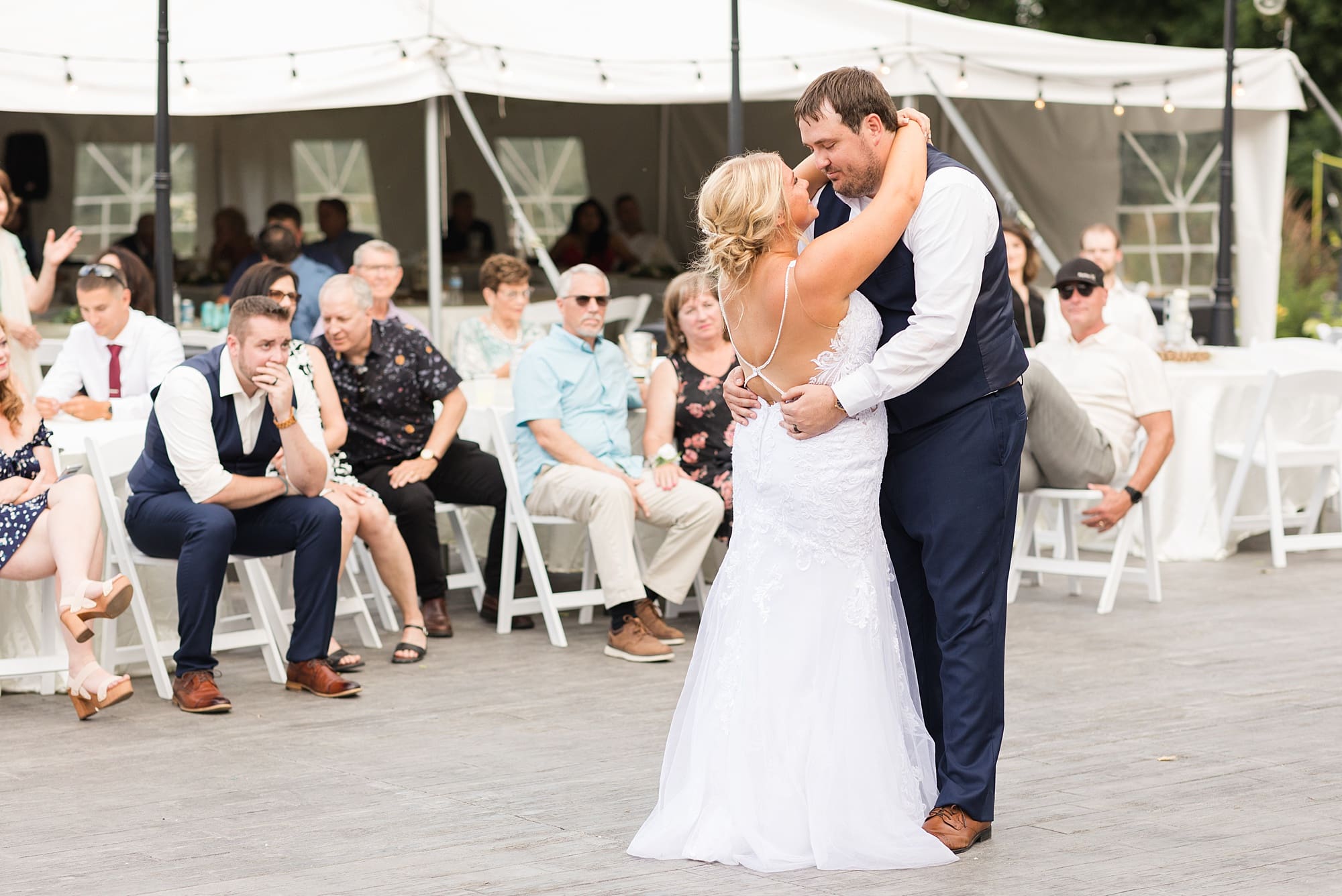 Bride and groom share their first dance outside at their Naastad Acres