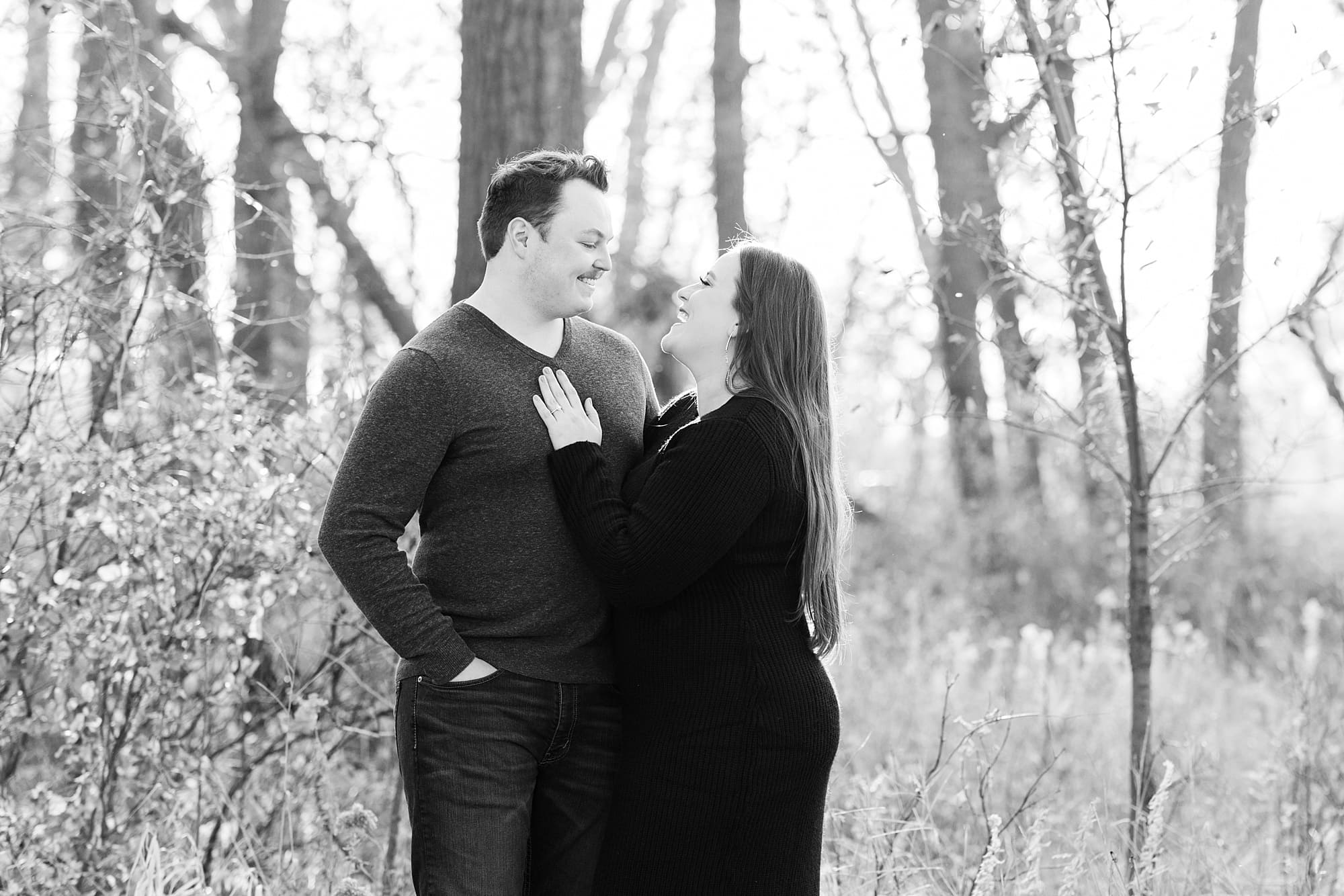 Black and white photo of an engaged couple during their Engagement Session at Sheyenne Grassland