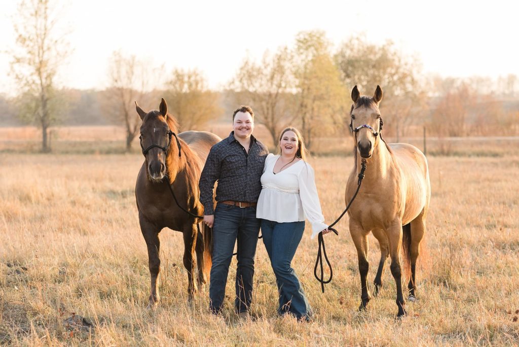 Engagement Session at Sheyenne Grassland with an engaged couple and two horses